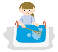 布団を干す女性